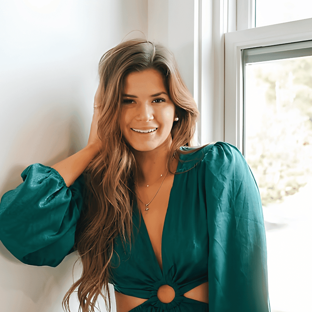 Portrait of Abigail Wilson, a professional stylist at The Wildflower Collective LLC, showcasing their expertise and style.